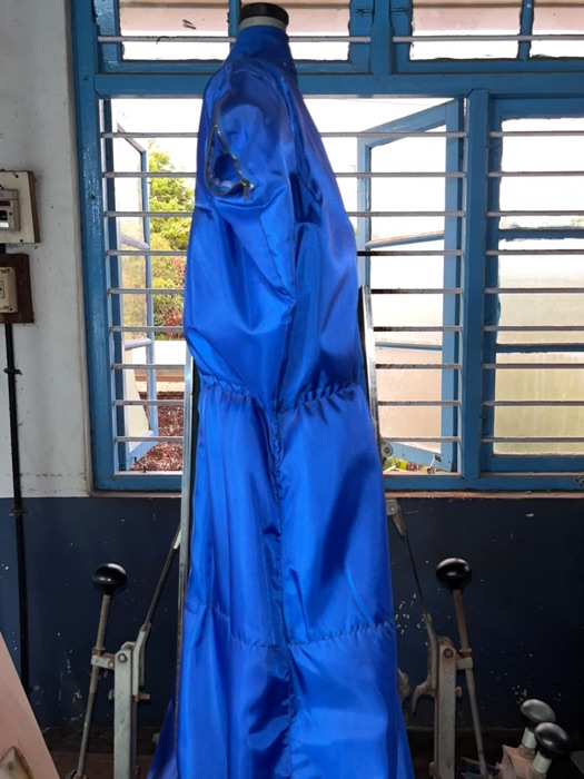 A garment pressed on the roll press at Coronet Cleaners